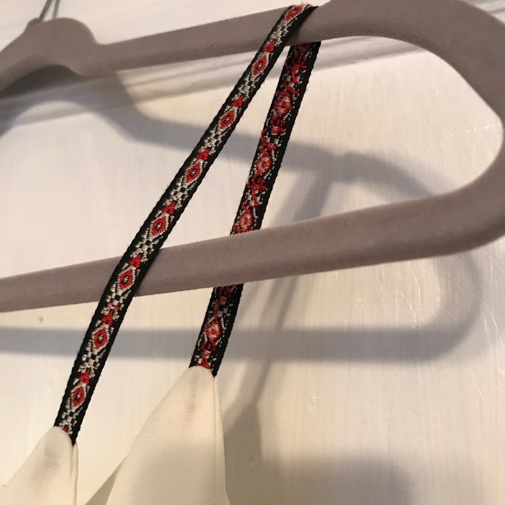 Beautiful off-white blouse with tribal straps